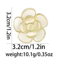 Detalle del broche de flor con strass y ojo de gato con medidas de 3,2 cm y 10,1 g - Forma de Camelia (C2721-2)