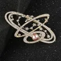 Himmels-Brosche mit Stern-Zirkonia und einer rosa Perle in goldener Ausführung - Gold Galaxie (K1009-GO)
