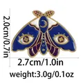 Mystic moth enamel pin in deep blue and purple with dimension and weight labels - Blue Purple Eye Moth (C2740-2)