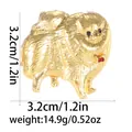 Detaillierte Ansicht der Pomeranian-Brosche mit rotem Edelstein und Maßen 3,2cm und 14,9g - Zwergspitz-Gold