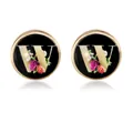 Classic gold round cufflinks featuring a black floral dial with a golden letter W design - Letter W Style