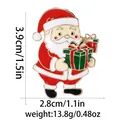 Enameled Santa Claus brooch holding a green gift box with golden alloy edges - Santa With Gift Box (BXT0002-4)