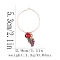 Detail view of gold hoop earring with red bell and purple grape charm with measurements - Grape Style (Z1345-9)