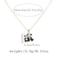 Ethnic panda pendant necklace in gold alloy featuring black and white enamel finish - Double Pandas Hugging