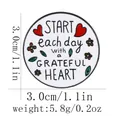 Round enamel pin with floral heart pattern and grateful heart quote on white background - Inspirational Quote Style (C3003)