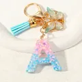 Detail of pink-blue gradient resin letter A keychain with glitter, butterfly and tassel - Letter A (D1417-A)