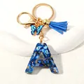 Blue resin letter A keychain with butterfly charm and velvet tassel in gold metal - Letter A (D1413-A)