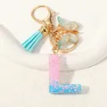 Letter L keychain with pink-blue gradient resin and sparkling star sequins - Letter L (D1417-L)