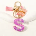 Portachiavi lettera S viola con paillettes, nappa rosa e ciondolo farfalla - Alfabeto S (D1414-S)