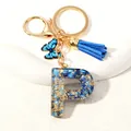 Letter P initial keychain with blue butterfly charm, tassel, and gold-plated hardware - Letter P (D1413-P)