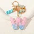 Letter W resin keychain with blue tassel and gold butterfly pendant for bags - Letter W (D1417-W)