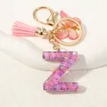 Portachiavi con lettera Z glitter viola con nappa rosa e ciondolo a farfalla - Alfabeto Z (D1414-Z)