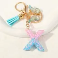 Pink and blue gradient resin letter X keychain with glitter, tassel, and gold butterfly - Letter X (D1417-X)