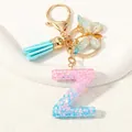 Letter Z keychain with blue gradient resin, sequins, tassel and gold butterfly charm - Letter Z (D1417-Z)