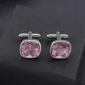 Macro shot of silver cufflinks with cushion cut pink crystal and T-shaped metal post - Pink