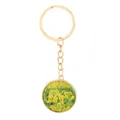 Golden keychain with round pendant featuring a yellow rapeseed flower design in resin - Gold Keychain (D1425-1)