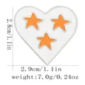 White heart enamel pin with orange stars and silver metal border, sized 2.9cm by 2.8cm - White Heart Orange Star (C3187-3)