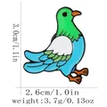 Spilla smaltata a forma di colomba verde e blu con dimensioni e peso dettagliati - Uccello dei cartoni animati verde blu