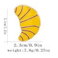 Golden croissant enamel pin brooch with yellow finish and brown stripes, 3.1cm height - Croissant Shape
