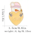 Cute pink snowman enamel pin holding a yellow love heart with size and weight details - Snowman Style (C3244-1)