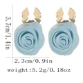 Light blue fabric 3D rose earrings with golden base and product size specifications - Light Blue