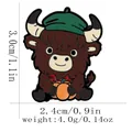 Cartoon highland cow enamel pin with pumpkin and green beret, size and weight details - Cow with Pumpkin (C3319-5)