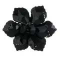 Macro view of a 3D crystal flower button with multifaceted black petals and glossy finish - Pure Black (B1646-9)