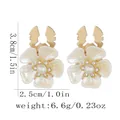 Floral cufflink featuring cream petals with a central pearl and gold-tone metal base - Gradient Pearl Flower Style (B1655-3)