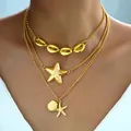 Juego de collares dorados de tres capas con estrellas de mar, conchas y cadena plana - 6512901hb
