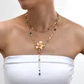Double-layered golden necklace with colorful round stones and floral charm tassel - 6512501hb