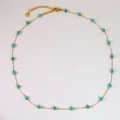 Gold chain necklace featuring sky blue turquoise cylinder beads and a lobster clasp - Turquoise Blue Necklace