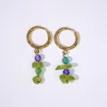 Detail of 14K gold-plated earrings with colorful natural stones and faceted purple beads - Peridot
