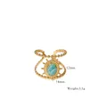 Detail of vintage sunburst ring with turquoise stone, 12x14mm size and 3.1g weight - Amazonite