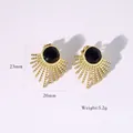 Macro detail of sunburst stone earrings measuring 23mm by 20mm with 5.2g weight - Earrings / Gold-Black Agate