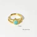 Anillo de acero dorado de 14K con piedra verde de 11mm y banda con diseño trenzado - Turquesa