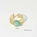 Anillo abierto de acero inoxidable chapado en oro 14K de tres capas con peridoto verde - Verde claro