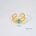 Verstelbare 14K vergulde ring van roestvrij staal met blauwe turquoise en zonnestraal-motief - Verstelbaar / R10-Amazoniet