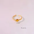 14K vergulde gehamerde open ring met een 6,3 mm ronde gele steen voor vrouwen - Verstelbaar / R13-Gele Schelp