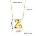 Macro shot of polished gold balloon letter Z pendant with detailed size and weight specs - Letter Z(Z88) / Gold
