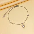 Detailed macro view of silver titanium steel heart anklet with small diamonds - Bracelet / Silver