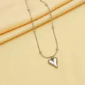 Elegant silver titanium steel heart pendant necklace on a smooth beaded snake chain - Necklace / Silver