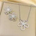 Elegant titanium steel flower necklace and earrings set with white sparkling zircons - Necklace And Earrings / Silver