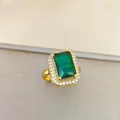 Retro emerald cut green gemstone ring with sparkling zircon halo in gold plating - Gold Emerald Ring