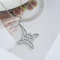 Macro shot of silver stainless steel Celtic witch knot necklace with a polished finish - Silver