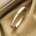 Rose gold titanium steel bracelet with white shell inlay on champagne satin background - Rose Gold