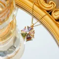 Titanium stalen ketting met kleurrijke zirkoon bloem hanger op een gouden spiegel - Ketting / Goud