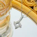 Silver geometric square pendant necklace with cubic zirconia on a reflective mirror base - Silver Necklace
