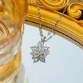 Titanium steel necklace with rotating rose pendant featuring white cubic zirconia stones - Silver