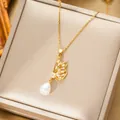 Titanium butterfly necklace with zircon stones and teardrop pearl pendant - Necklace