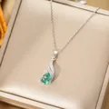 Titanium steel necklace with teardrop green gemstone pendant in a satin jewelry box - Silver Necklace